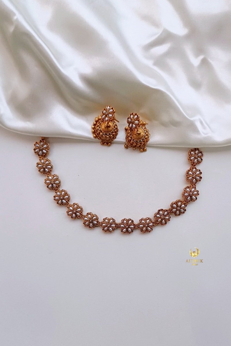 Pearl floral necklace with jhumkas AN93